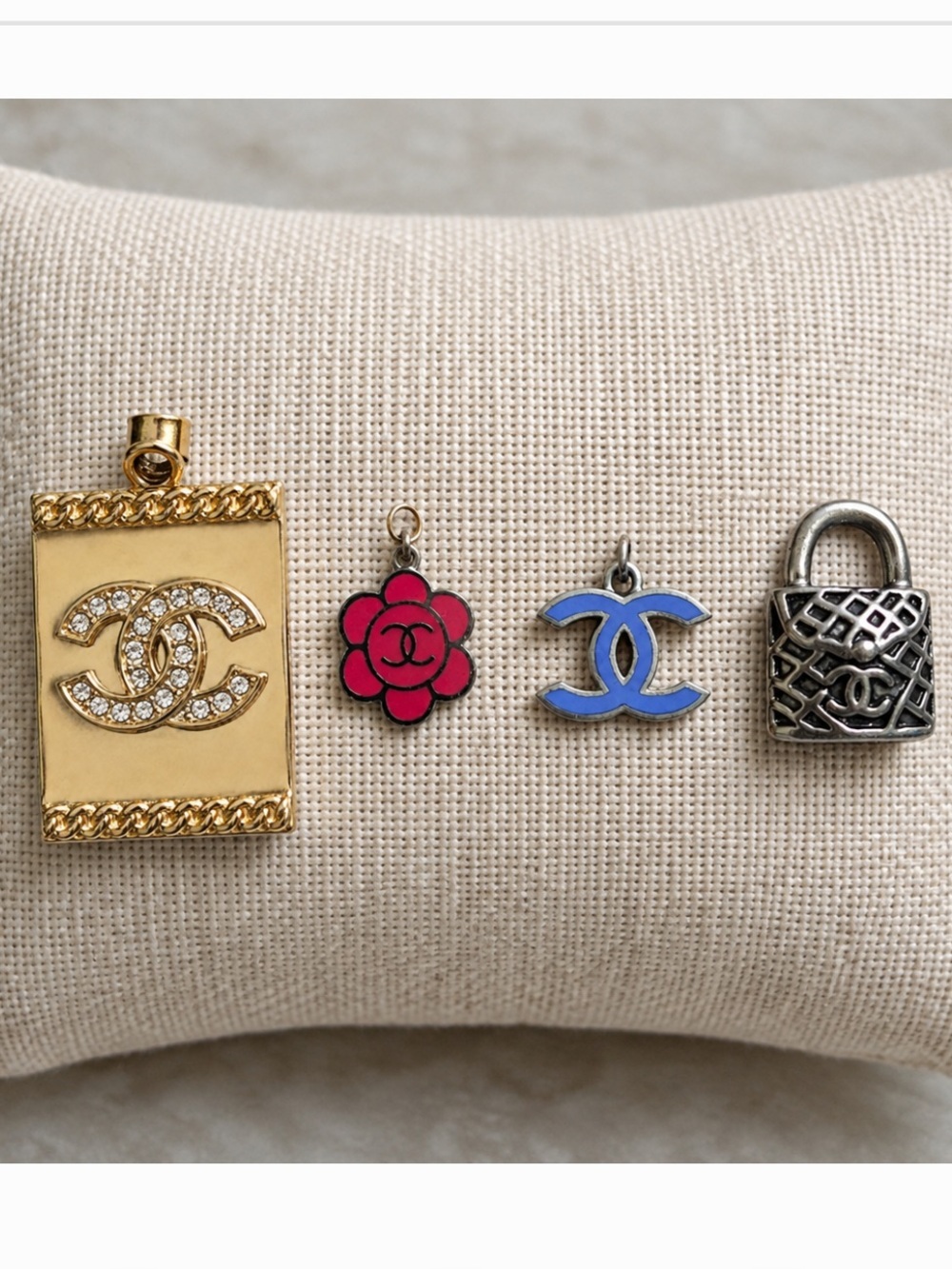 4 piece Gold, Pink, Purple, Silver Mixed Logo Pendant Bundle with 3 chains